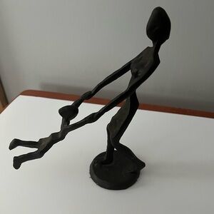 Mother Swinging Child Cast Iron Sculpture